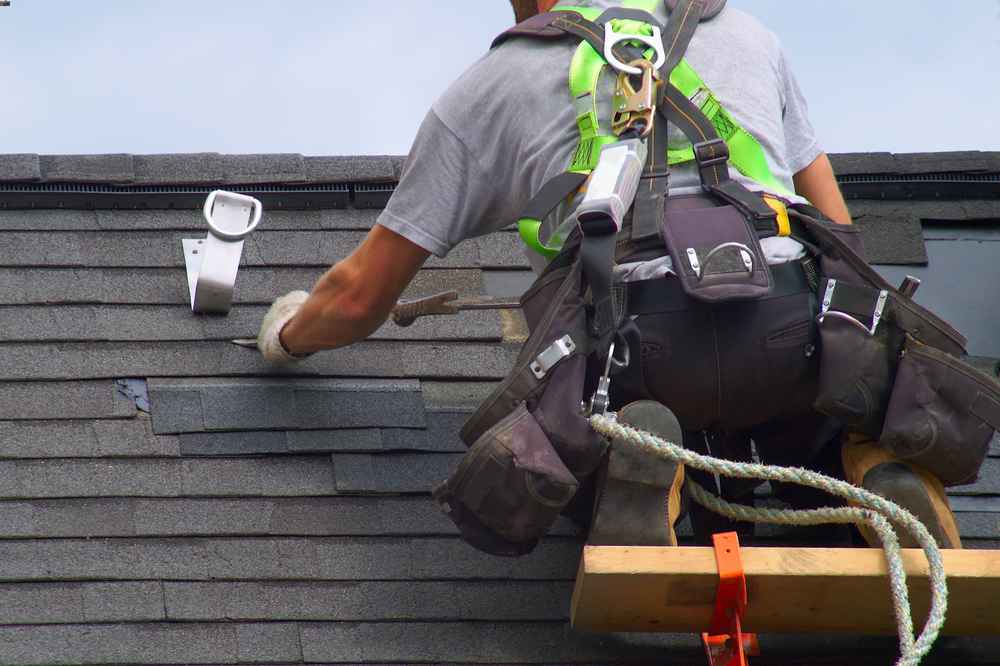 inspecting roof after summer storm in North Carolina